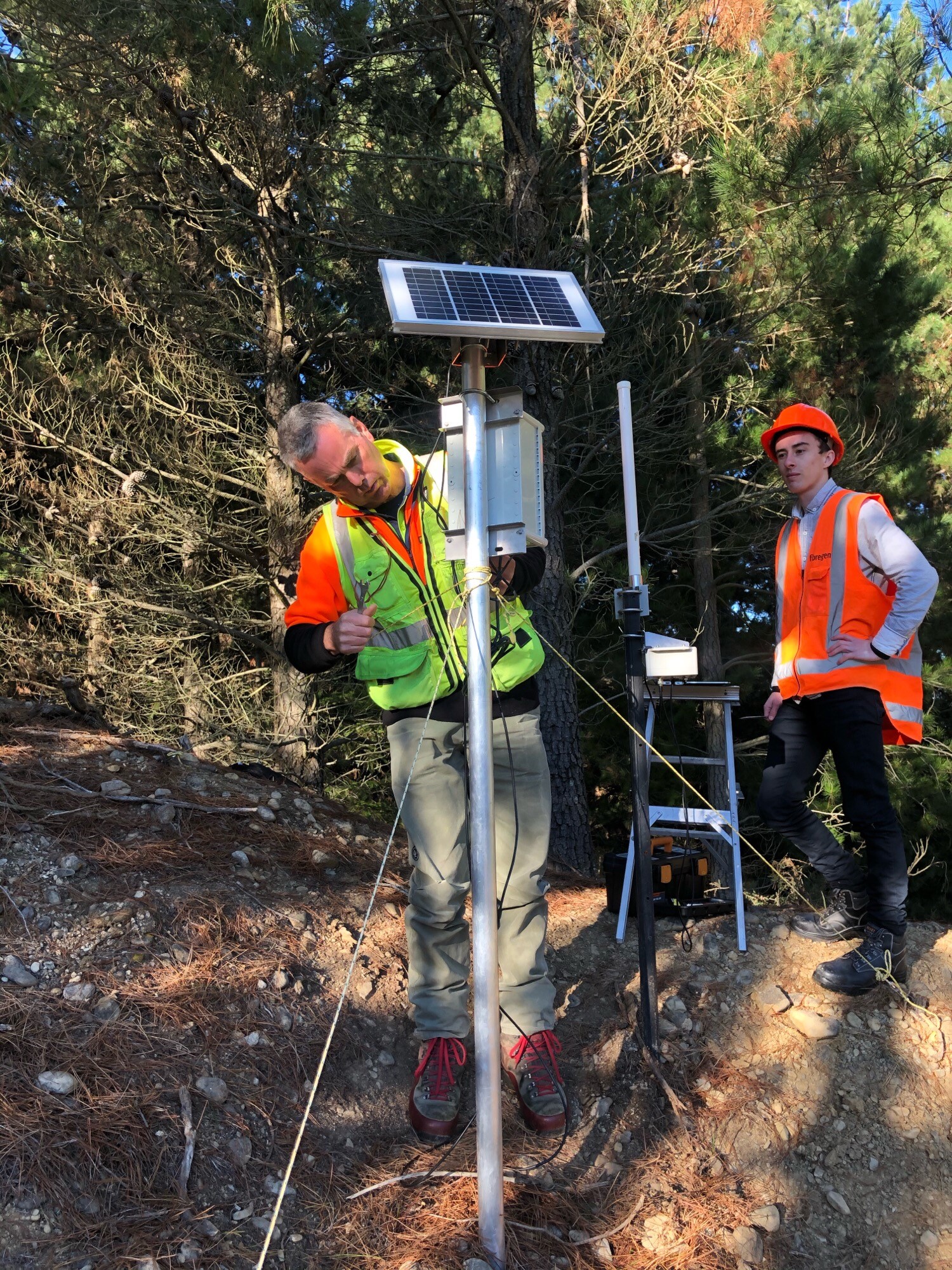 Forest Flows data logger being installed